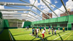 image of SYNLawn artificial grass on roof top playground brooklyn new york boys and girls club