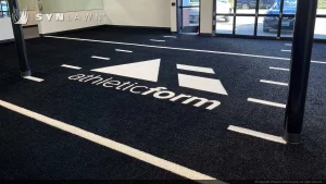 image of SYNLawn Prefab Turf Logos for Athletic Weight Room Applications